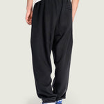 Pantalon Buzo Hombre Stretch Logo Fleece Negro Vans