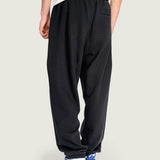 Pantalon Buzo Hombre Stretch Logo Fleece Negro Vans