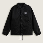 Chaqueta coach Vans Torrey negra con logo ovalado blanco, vista frontal
