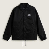 Chaqueta coach Vans Torrey negra con logo ovalado blanco, vista frontal